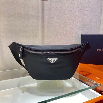 Black nylon belt bag with a curved body and a metal plate on the front