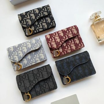 Five saddle-shaped flap card holders in jacquard fabric with hook clasps
